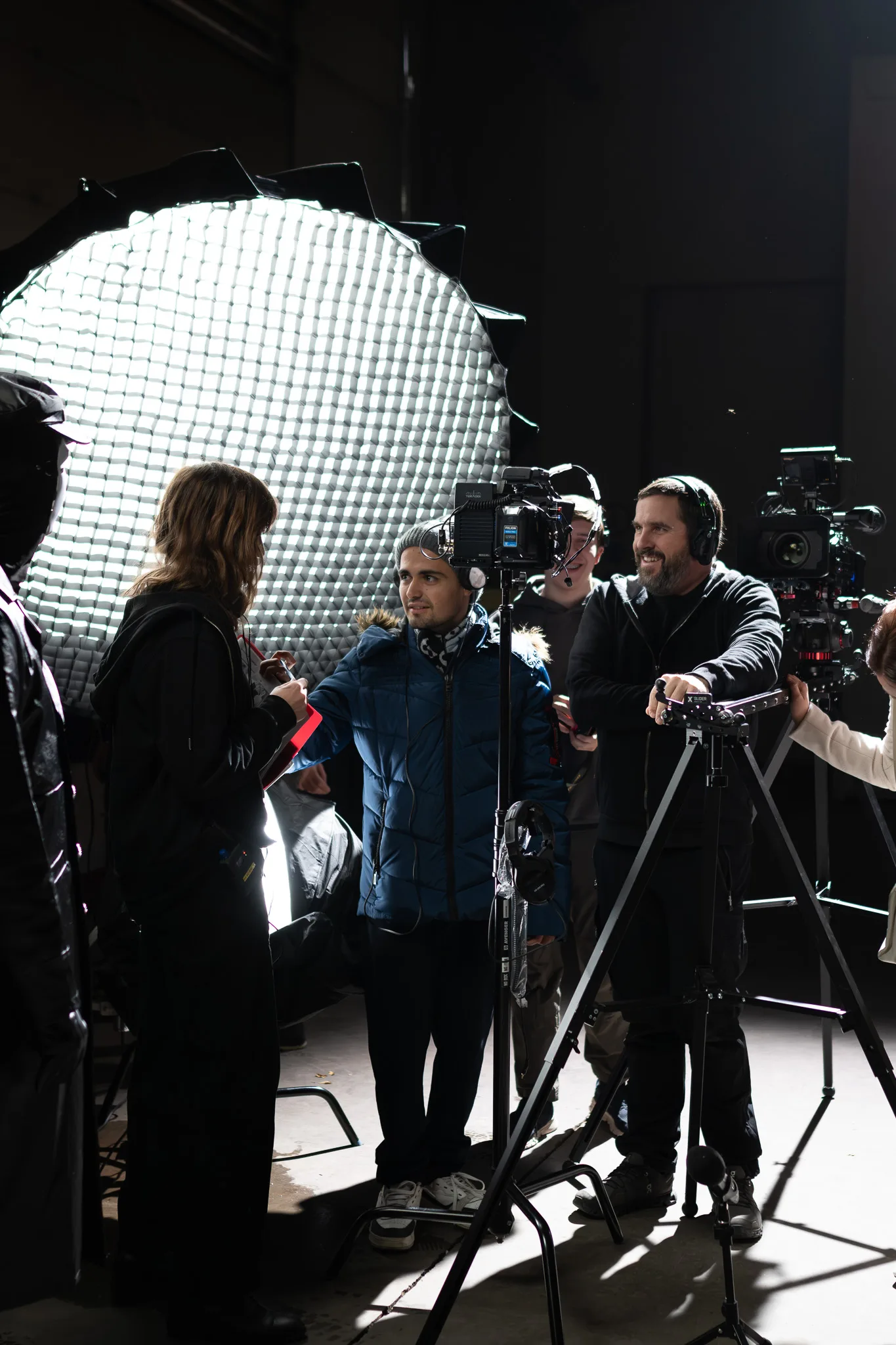 Crew at the giant soft light during a lighting check